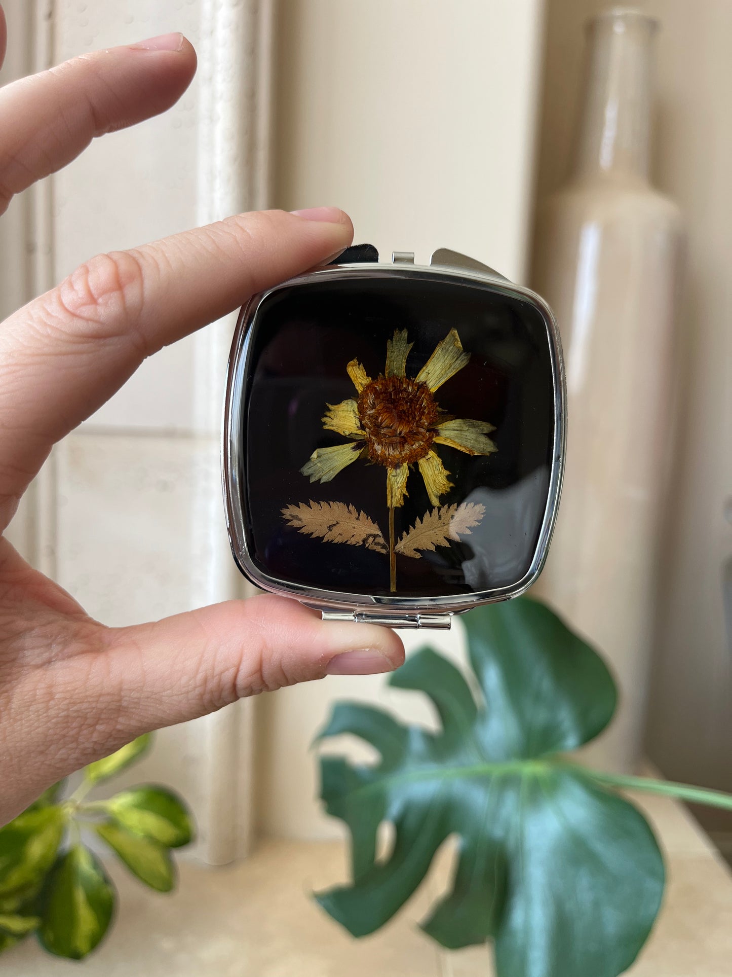 yellow flower compact mirror