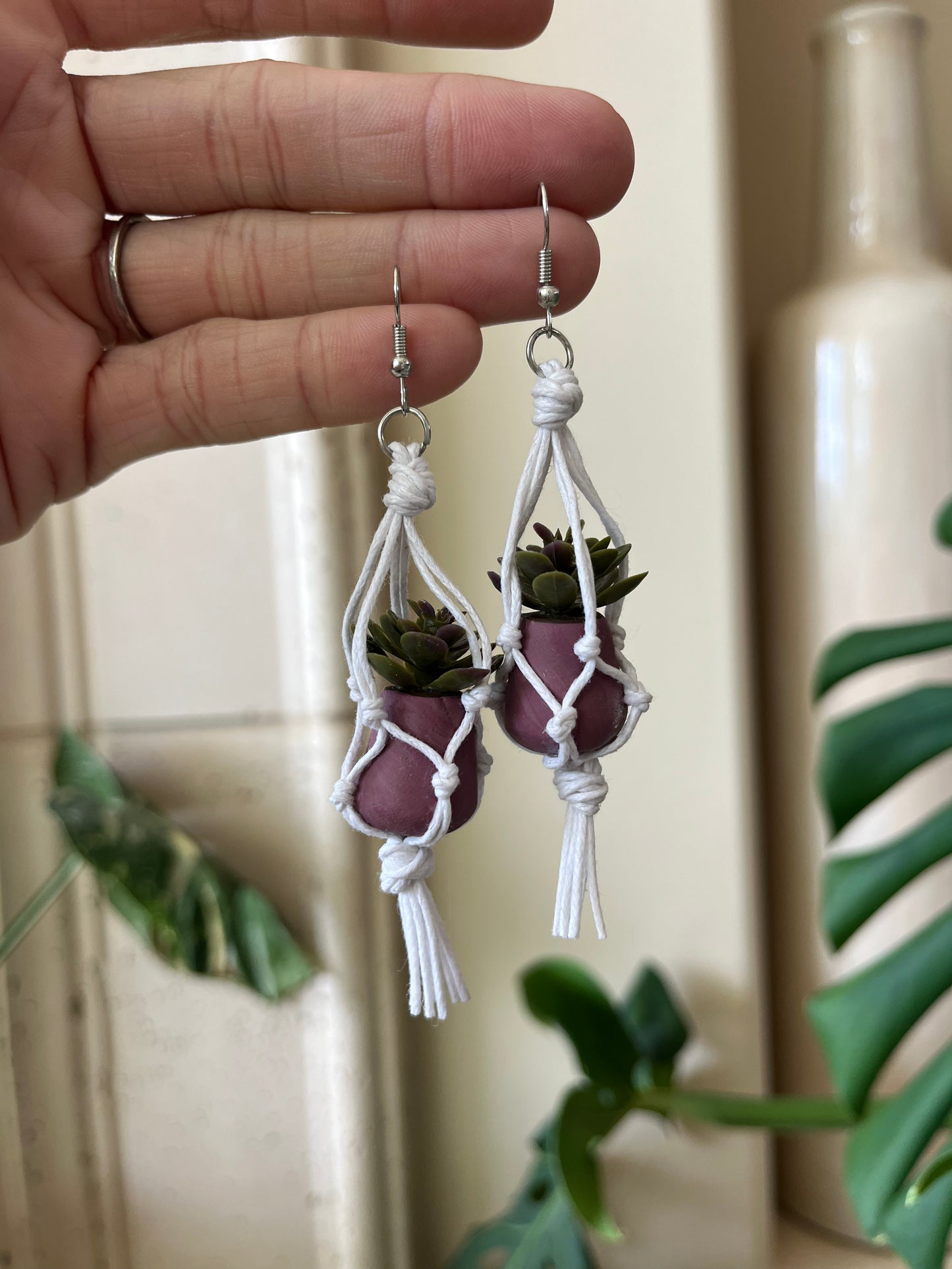 white string - purple pot