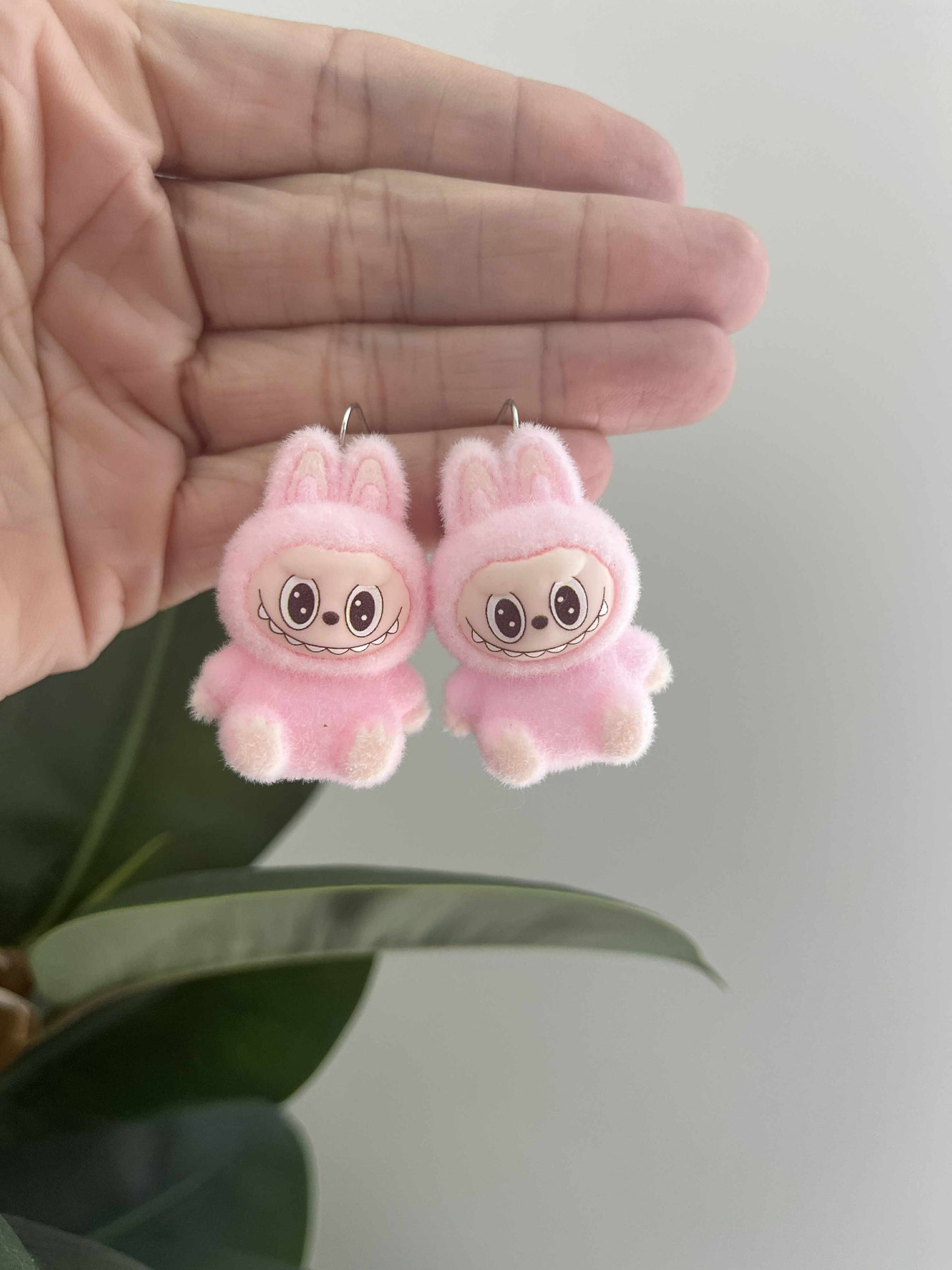 pink sitting - silver metal