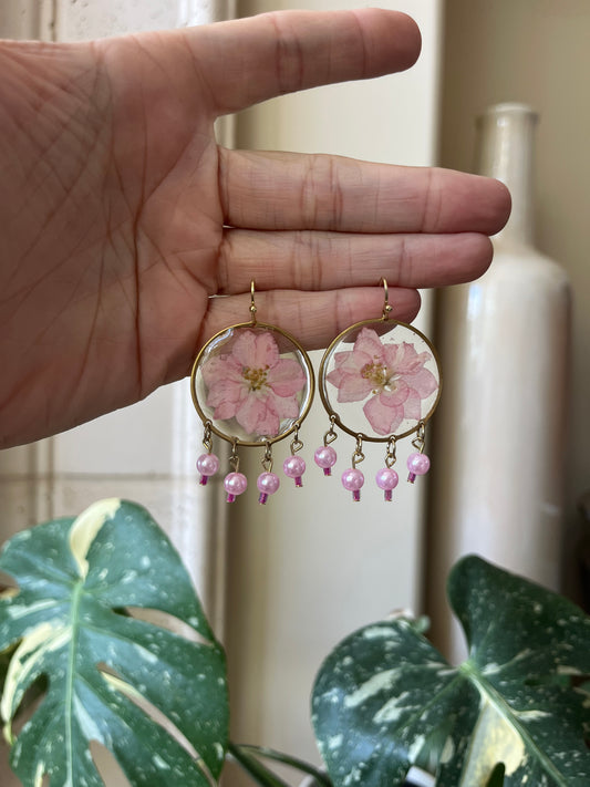 Pink larkspur with beads