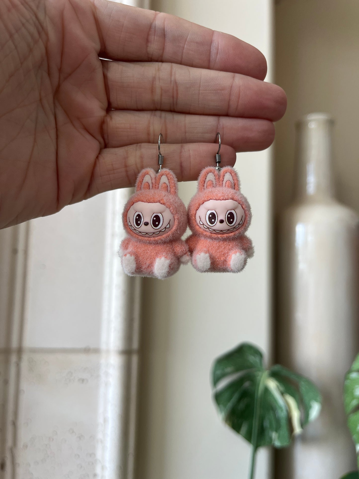 orange sitting - silver metal