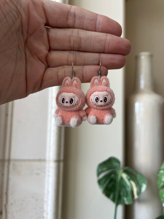 orange sitting - silver metal