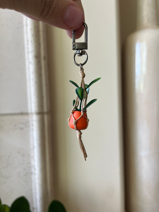 tan string - orange pot