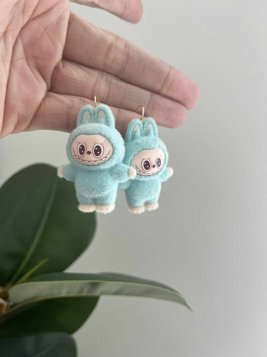 teal standing - gold metal